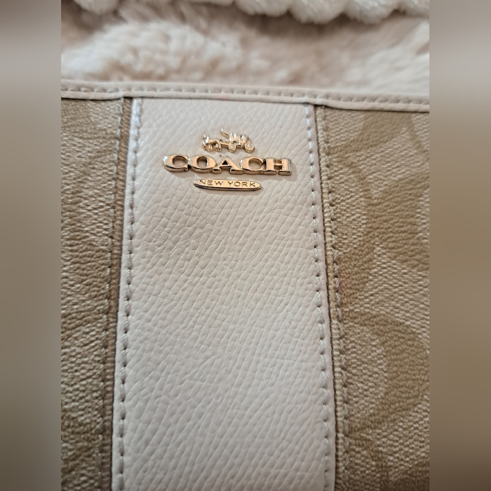 Coach Tan and Cream Wallet.